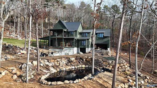 1.53 Acres of Residential Land with Home for Sale in Guntersville, Alabama