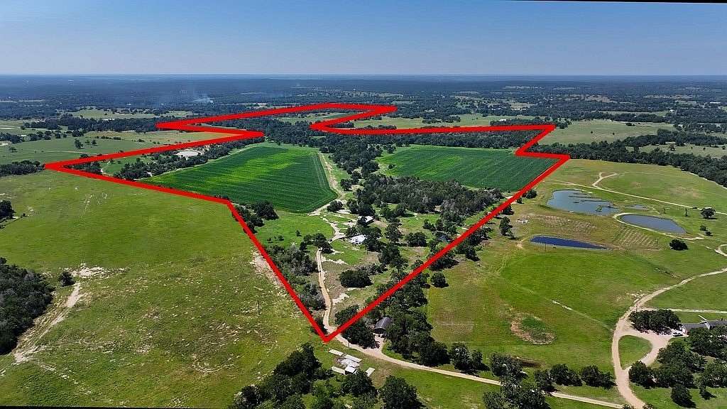 205 Acres of Land with Home for Sale in Winchester, Texas