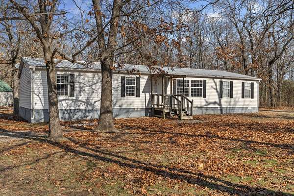 3.5 Acres of Residential Land with Home for Sale in Niangua, Missouri