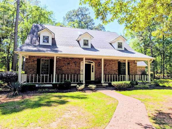 9.6 Acres of Land with Home for Sale in Camden, Arkansas