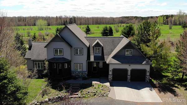 3 Acres of Land with Home for Sale in Chassell, Michigan