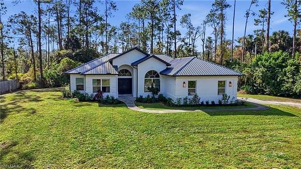 2.27 Acres of Residential Land with Home for Sale in Naples, Florida