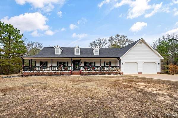 11.4 Acres of Land with Home for Sale in Bankston, Alabama