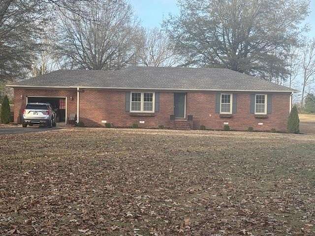 2.48 Acres of Residential Land with Home for Sale in Huntingdon, Tennessee