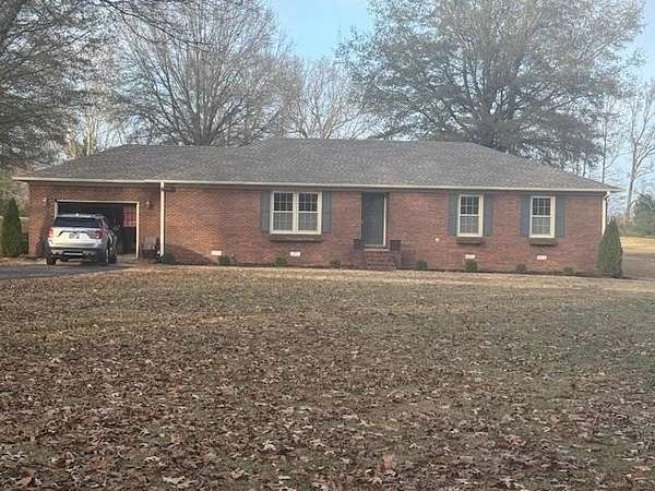 2.48 Acres of Residential Land with Home for Sale in Huntingdon, Tennessee