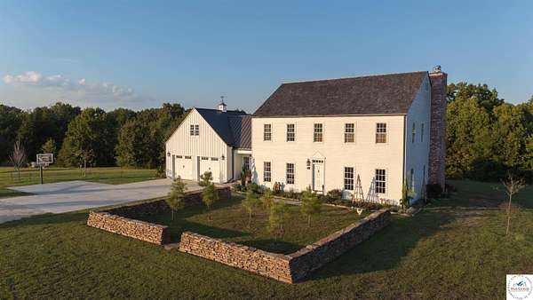 15 Acres of Land with Home for Sale in Versailles, Missouri