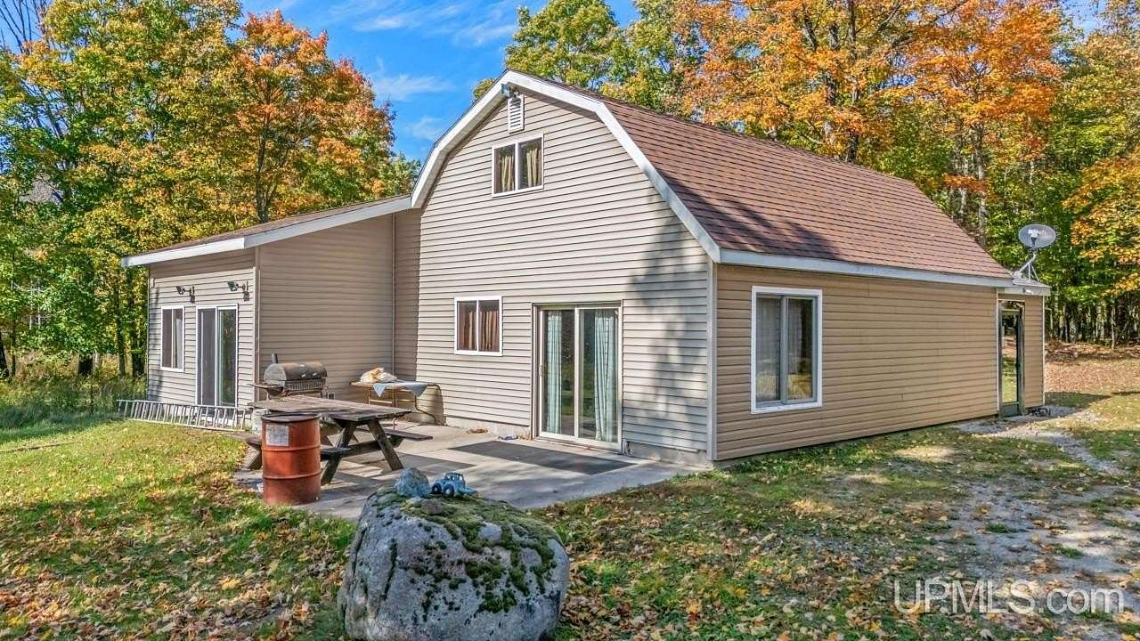 7.46 Acres of Land with Home for Sale in Rapid River, Michigan
