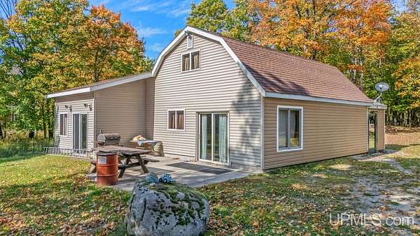 7.46 Acres of Land with Home for Sale in Rapid River, Michigan