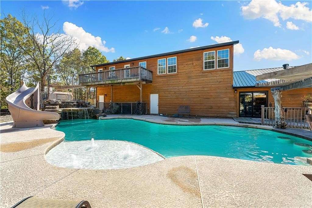 7.35 Acres of Land with Home for Sale in Garfield, Arkansas