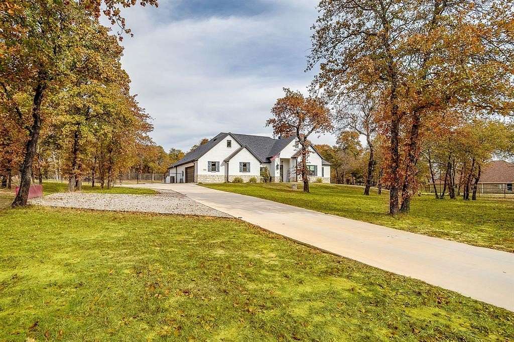 2 Acres of Residential Land with Home for Sale in Poolville, Texas