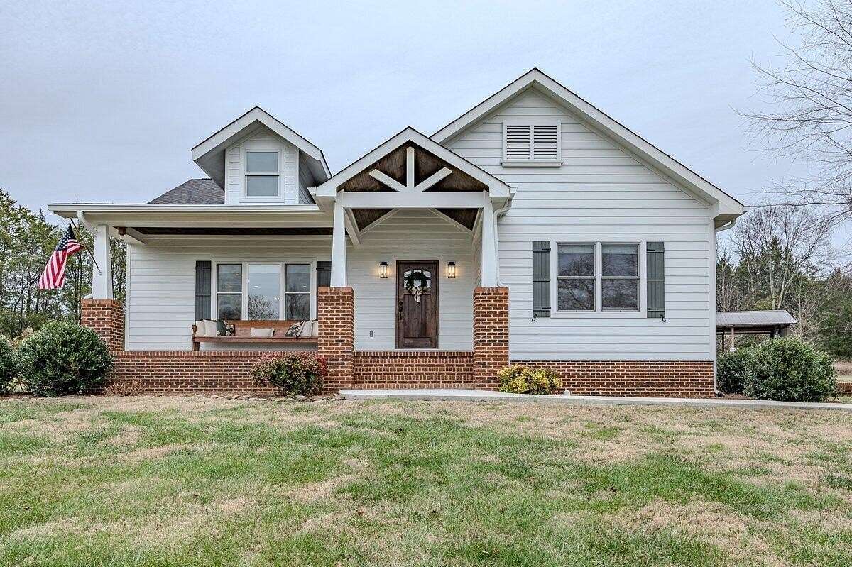 5 Acres of Residential Land with Home for Sale in Riceville, Tennessee