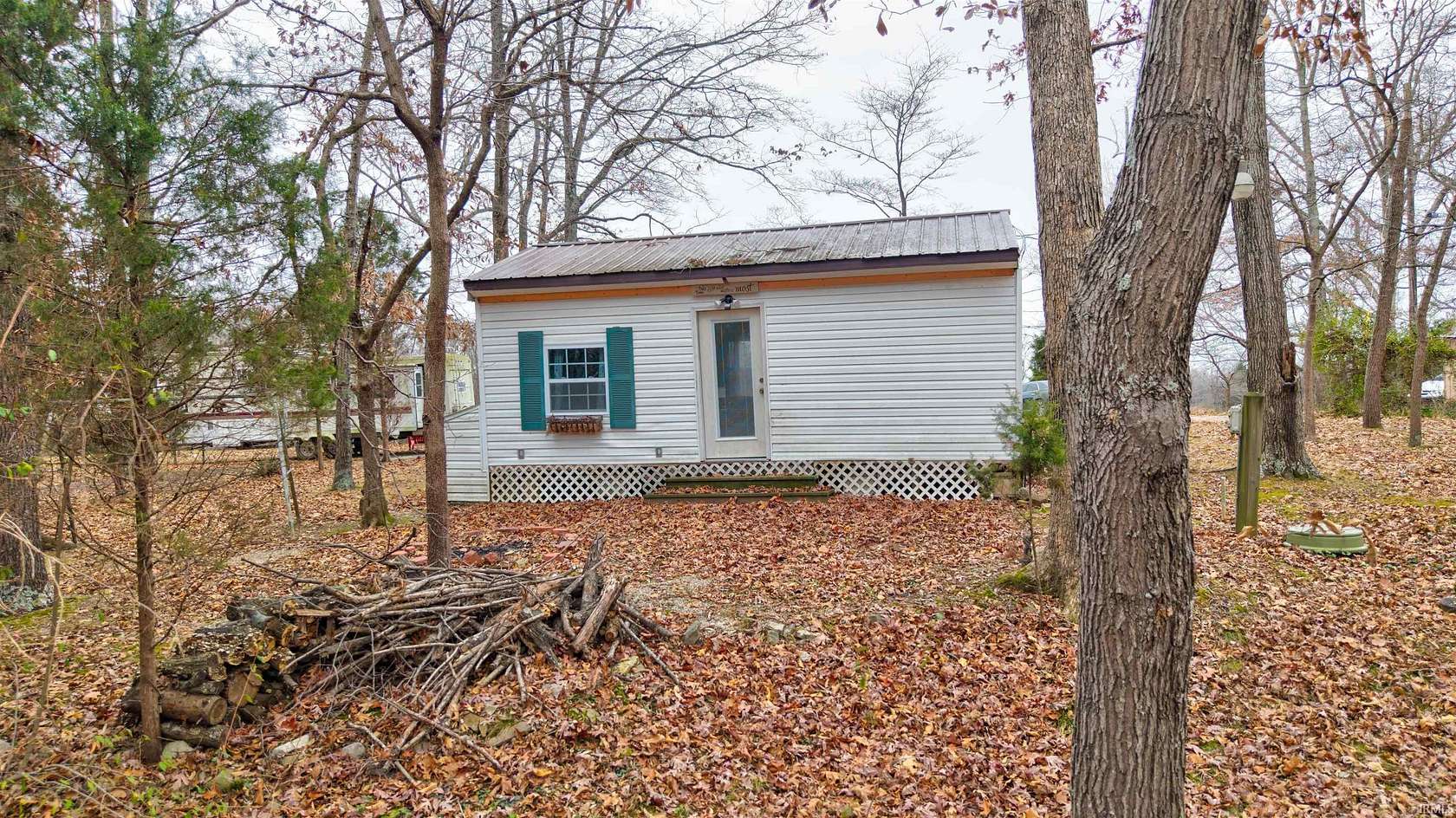 0.76 Acres of Land with Home for Sale in Dale, Indiana
