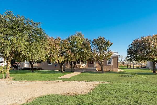 12.8 Acres of Land with Home for Sale in Venus, Texas