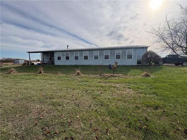 7 Acres of Residential Land with Home for Sale in Adrian, Missouri