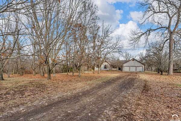 7.2 Acres of Residential Land with Home for Sale in Lawrence, Kansas