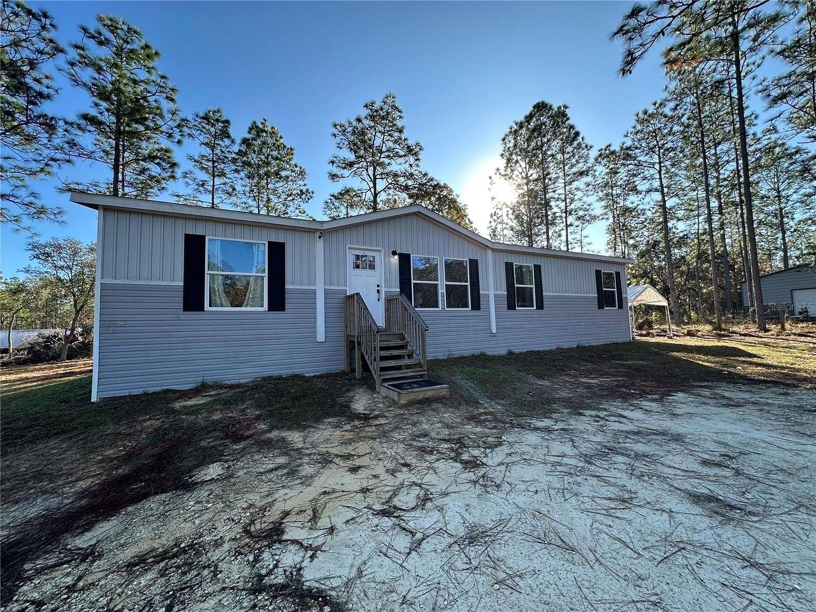 2.5 Acres of Residential Land with Home for Sale in Williston, Florida