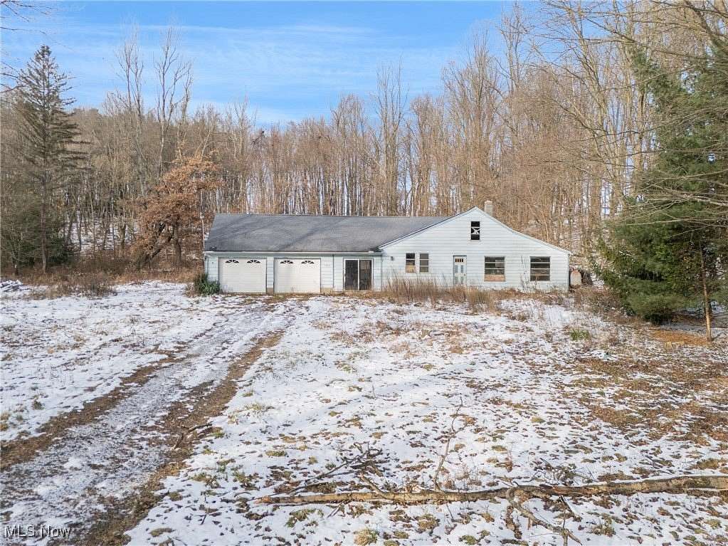 6.5 Acres of Residential Land with Home for Auction in Louisville, Ohio