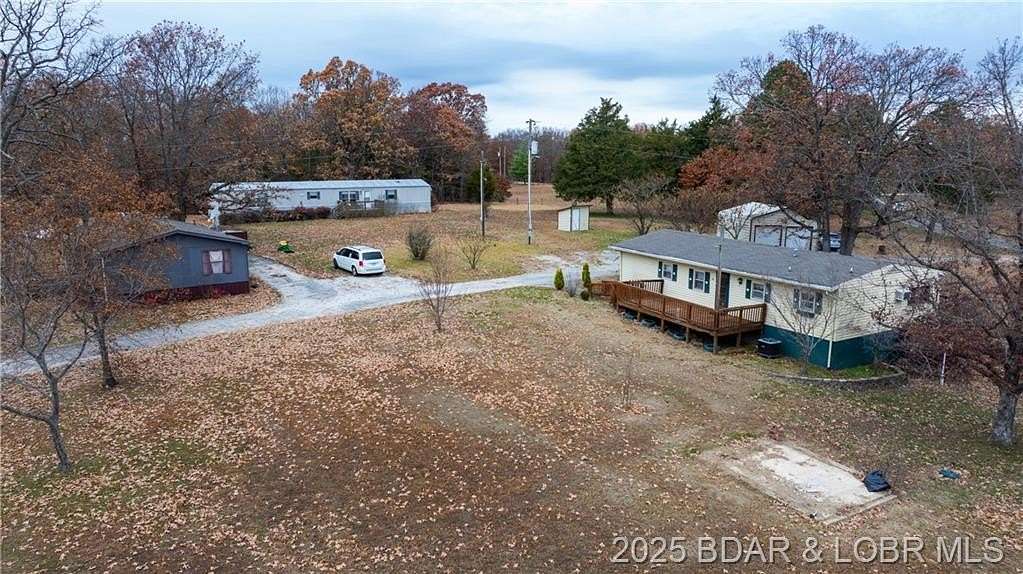 3.16 Acres of Residential Land with Home for Sale in Camdenton, Missouri