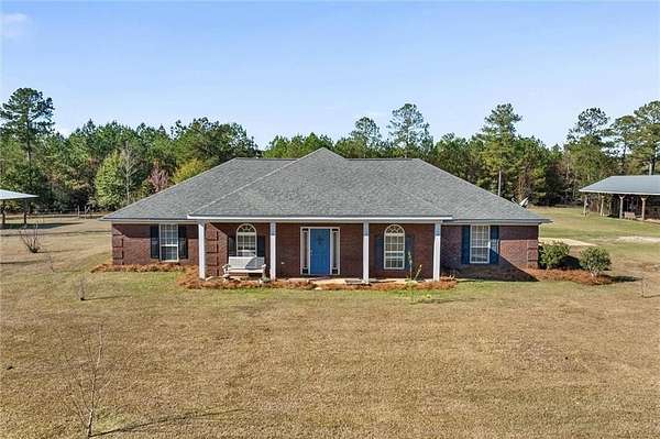 8.87 Acres of Land with Home for Sale in Wilmer, Alabama