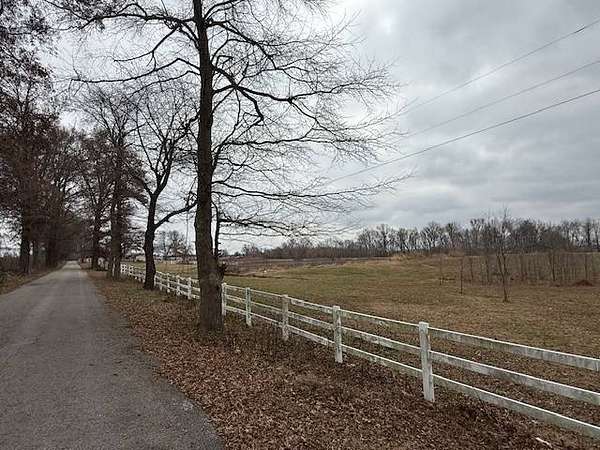 21.2 Acres of Agricultural Land with Home for Auction in Robards, Kentucky