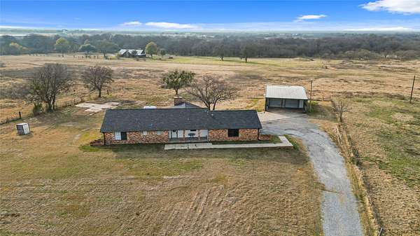 2.85 Acres of Land with Home for Sale in Sherman, Texas