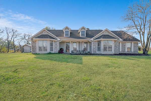 6.46 Acres of Land with Home for Sale in Deport, Texas