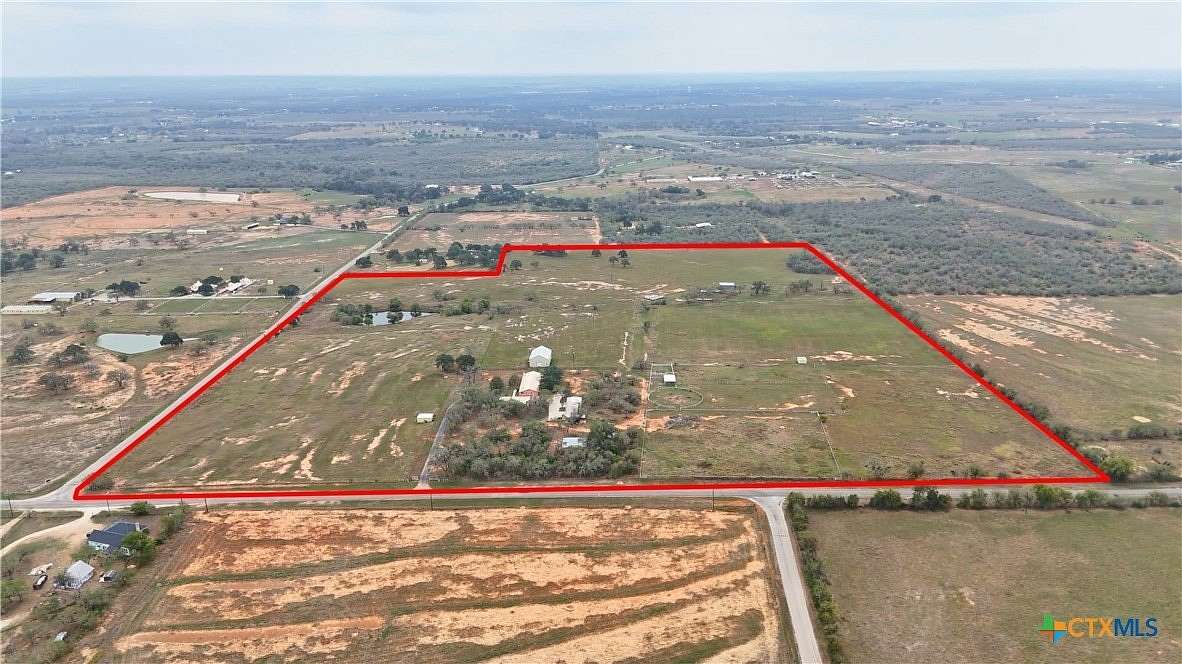 60 Acres of Agricultural Land with Home for Sale in Seguin, Texas