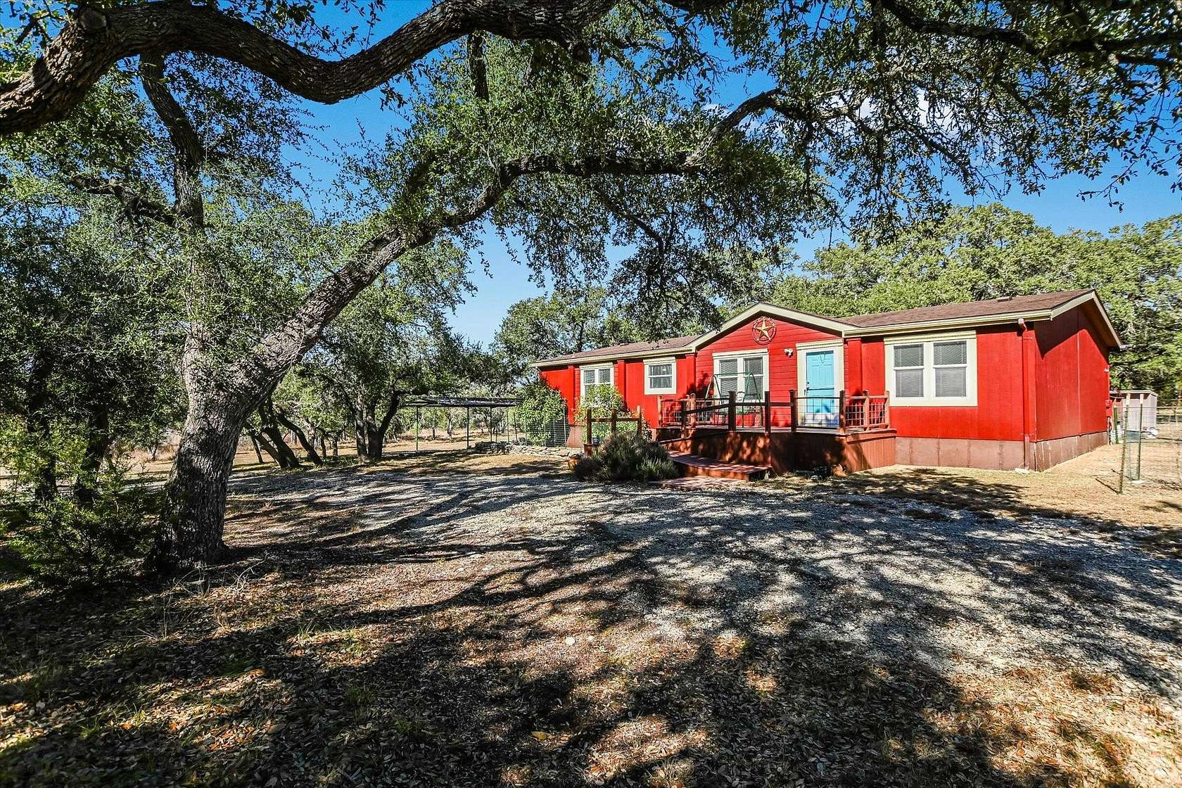 5.79 Acres of Residential Land with Home for Sale in Wimberley, Texas