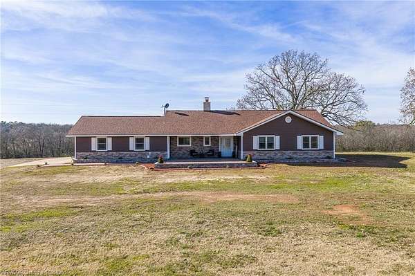 155 Acres of Land with Home for Sale in Waldron, Arkansas