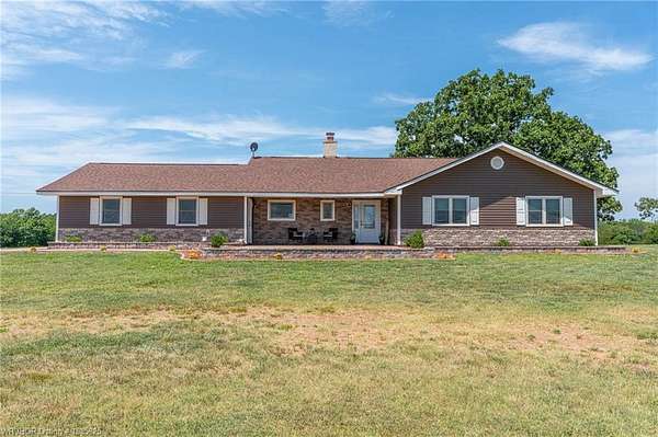155 Acres of Land with Home for Sale in Waldron, Arkansas