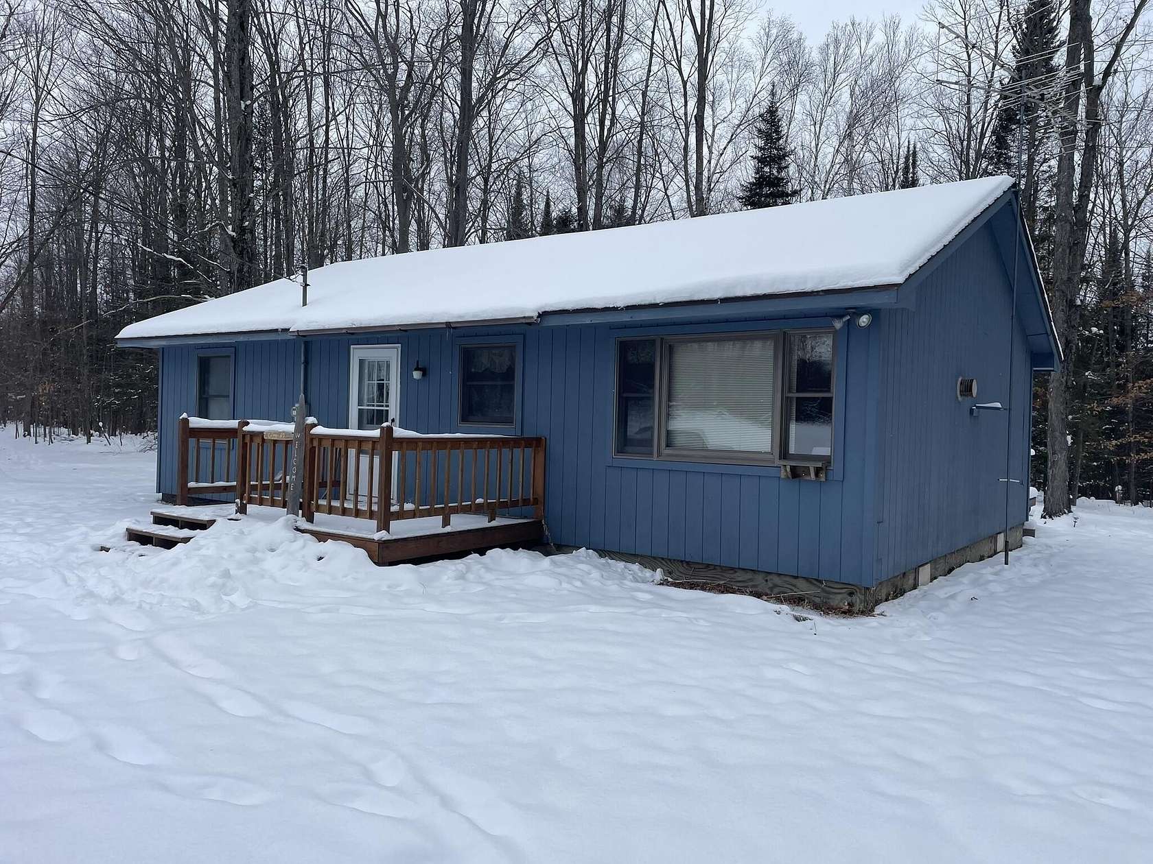 70 Acres of Recreational Land with Home for Sale in Afton, Michigan