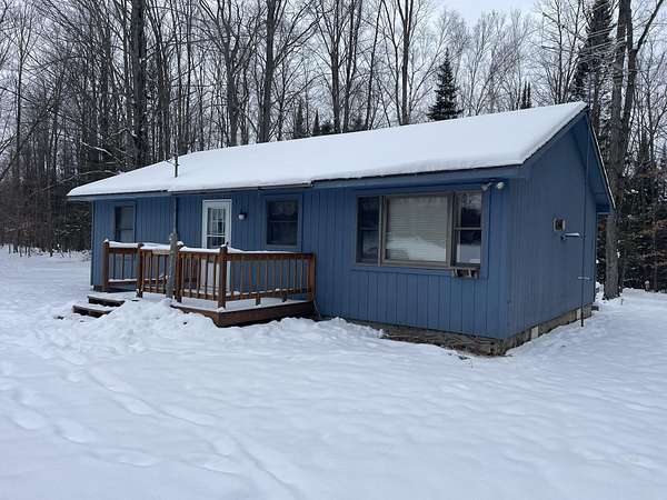 70 Acres of Recreational Land with Home for Sale in Afton, Michigan