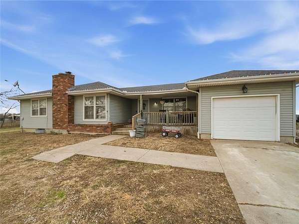 9 Acres of Residential Land with Home for Sale in Holden, Missouri