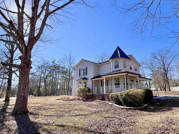 3.62 Acres of Residential Land with Home for Sale in Guys, Tennessee