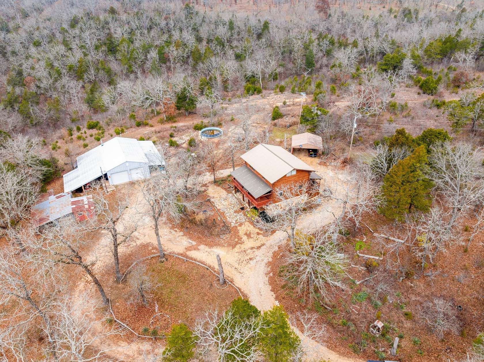 56 Acres of Land with Home for Sale in Cedarcreek, Missouri