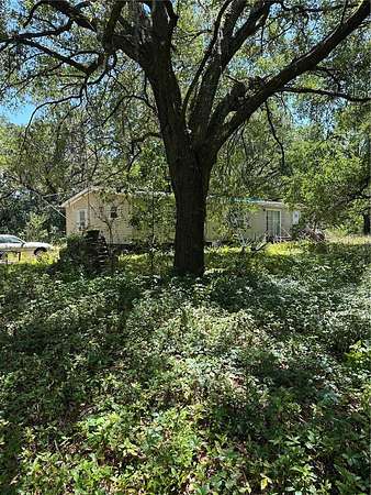5 Acres of Residential Land with Home for Sale in Groveland, Florida