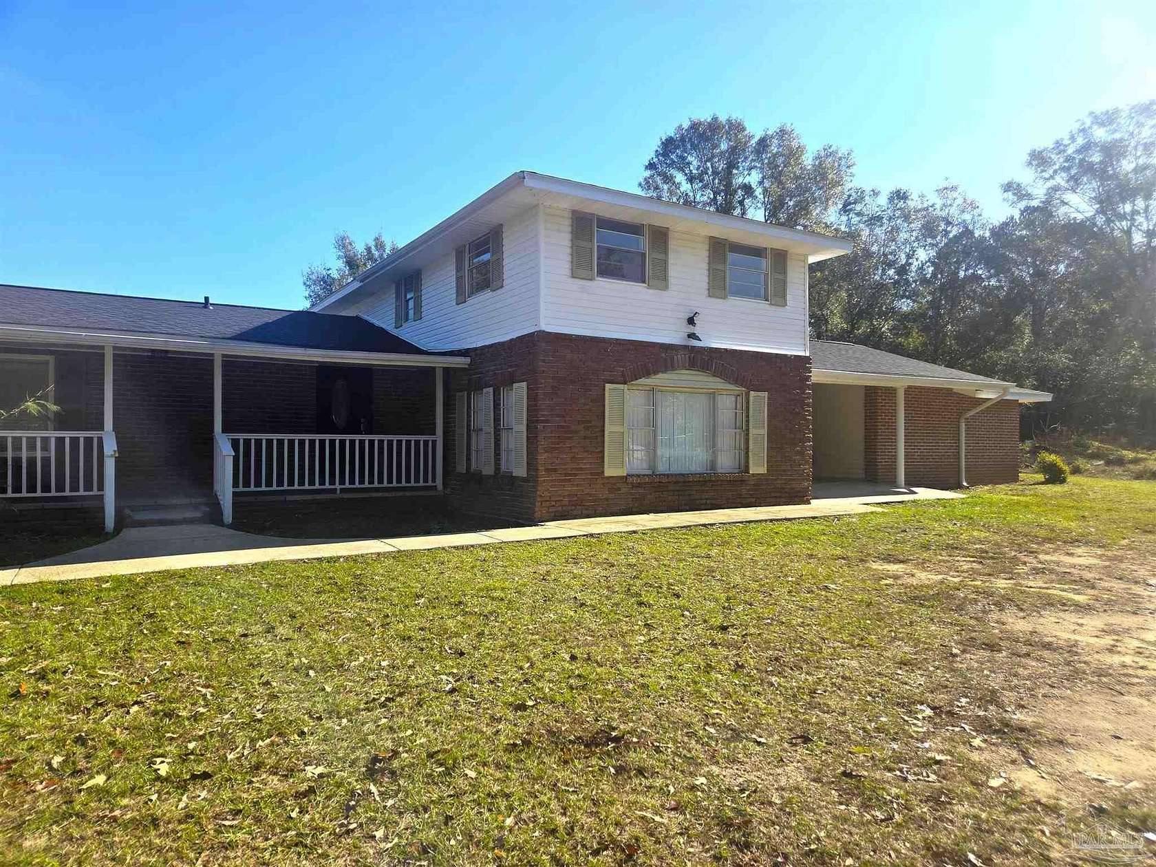 2 Acres of Residential Land with Home for Sale in Century, Florida