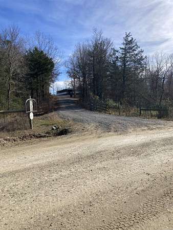 103 Acres of Recreational Land with Home for Sale in Mena, Arkansas