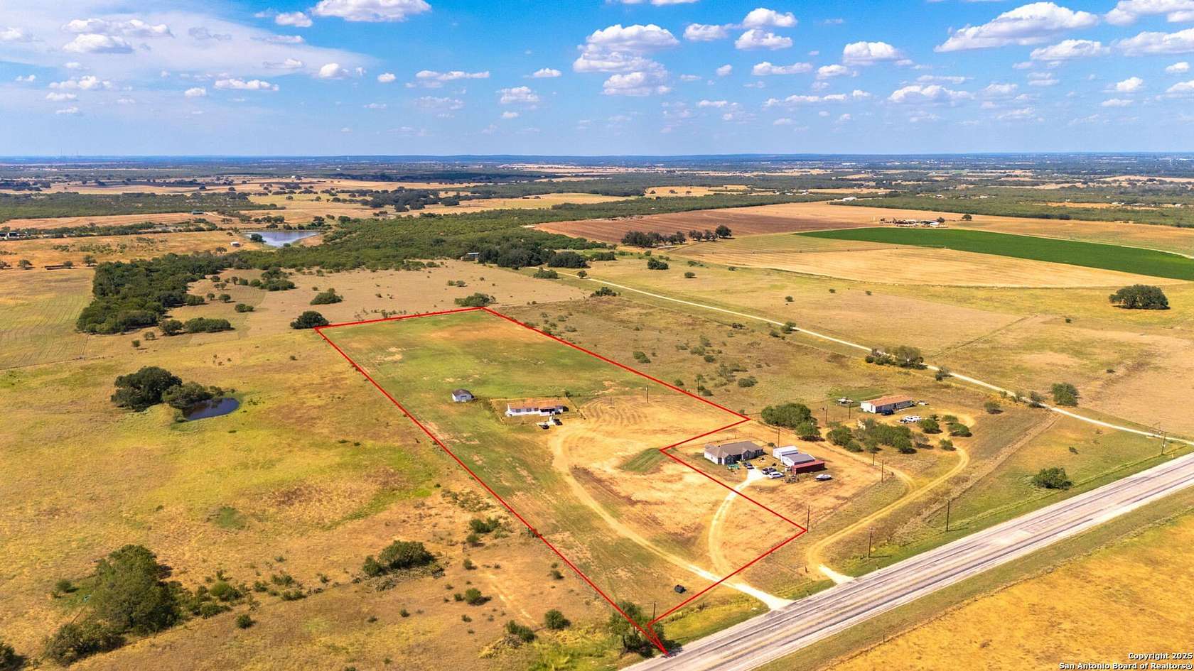 11.8 Acres of Land with Home for Sale in Floresville, Texas