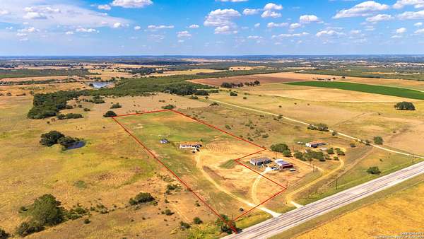 11.8 Acres of Land with Home for Sale in Floresville, Texas
