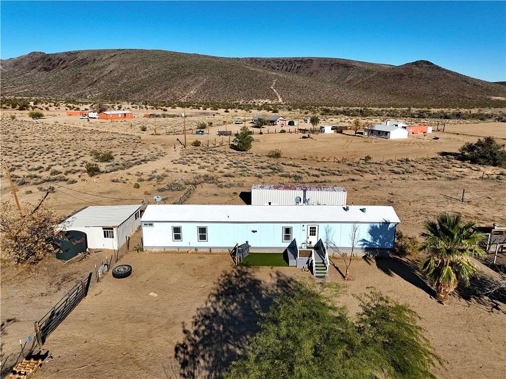 5.1 Acres of Residential Land with Home for Sale in Kingman, Arizona