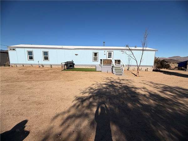 5.1 Acres of Residential Land with Home for Sale in Kingman, Arizona