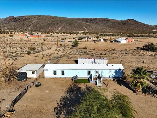 5.1 Acres of Residential Land with Home for Sale in Kingman, Arizona
