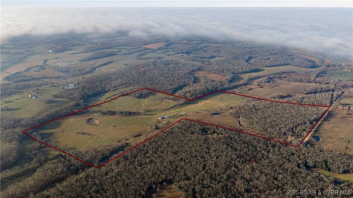 105 Acres of Land with Home for Sale in Stoutland, Missouri