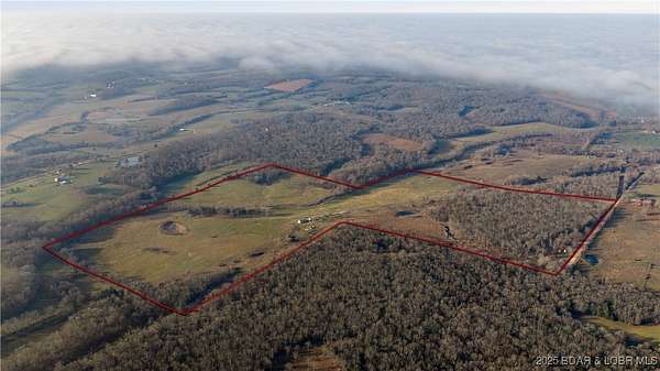 105 Acres of Land with Home for Sale in Stoutland, Missouri