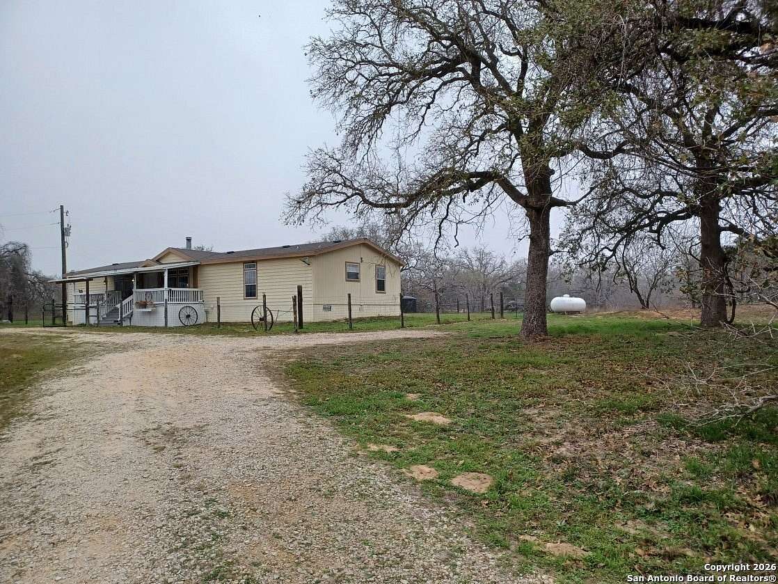 10 Acres of Land with Home for Sale in Stockdale, Texas