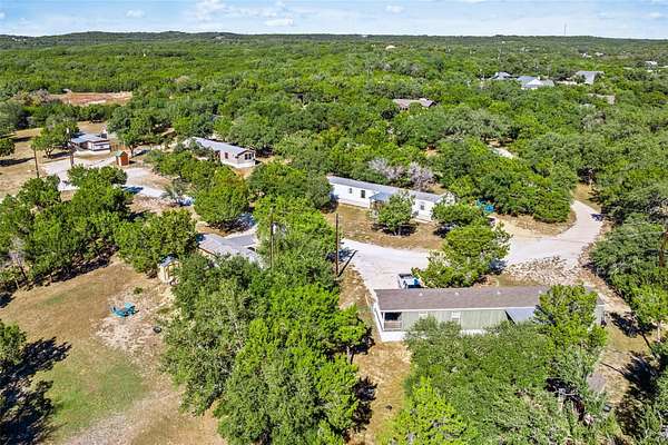 20.6 Acres of Recreational Land with Home for Sale in Canyon Lake, Texas