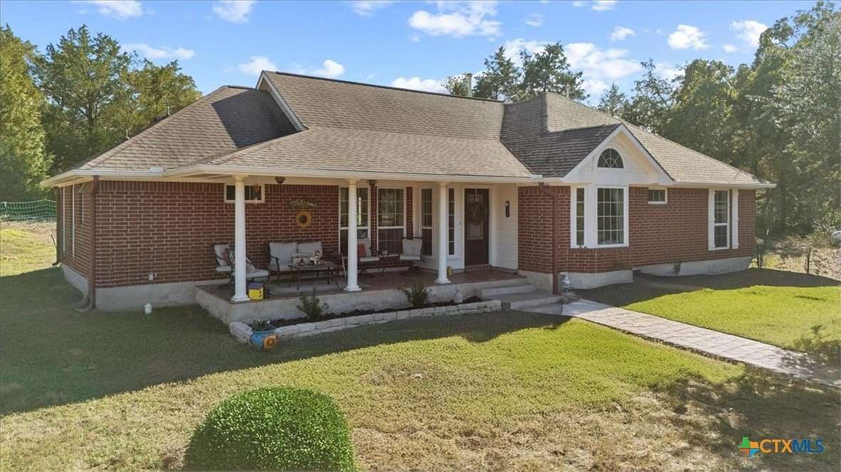 6 Acres of Residential Land with Home for Sale in Smithville, Texas