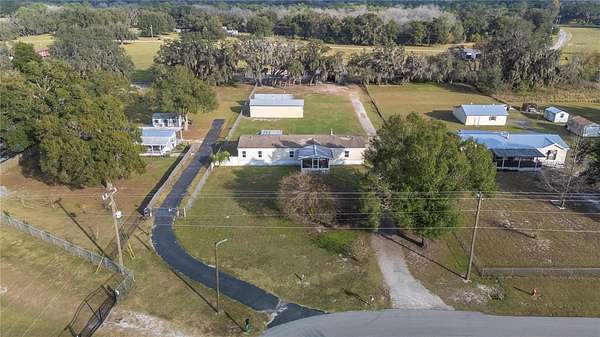 4 Acres of Residential Land with Home for Sale in Polk City, Florida