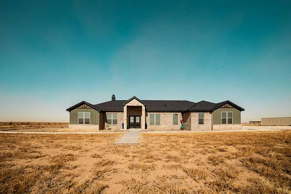 10 Acres of Residential Land with Home for Sale in Idalou, Texas